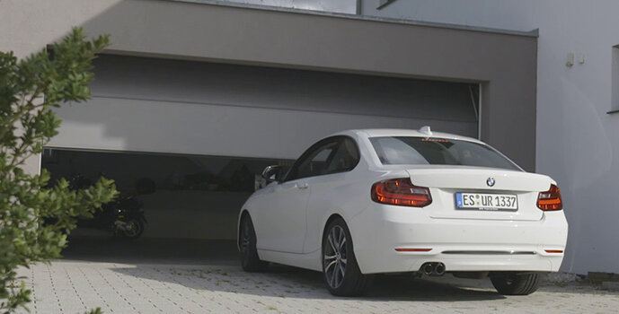 Retrofitting an electric garage door opener